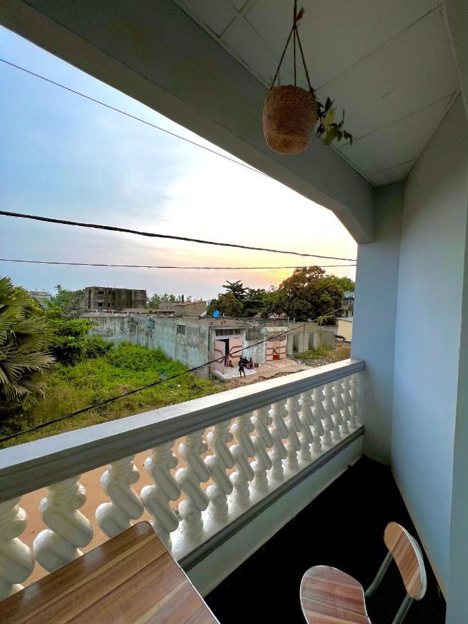 Bel appartement avec petit balcon sympa Porto-Novo Extérieur photo